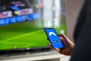 Family watching IPTV subscription USA service on smart TV in modern living room 2026